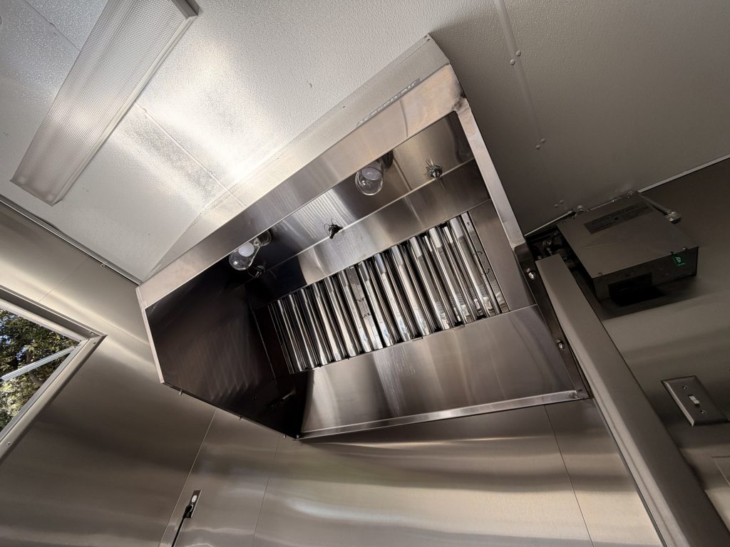 Commercial exhaust hood inside Bobo’s Cafe 18-ft custom coffee trailer