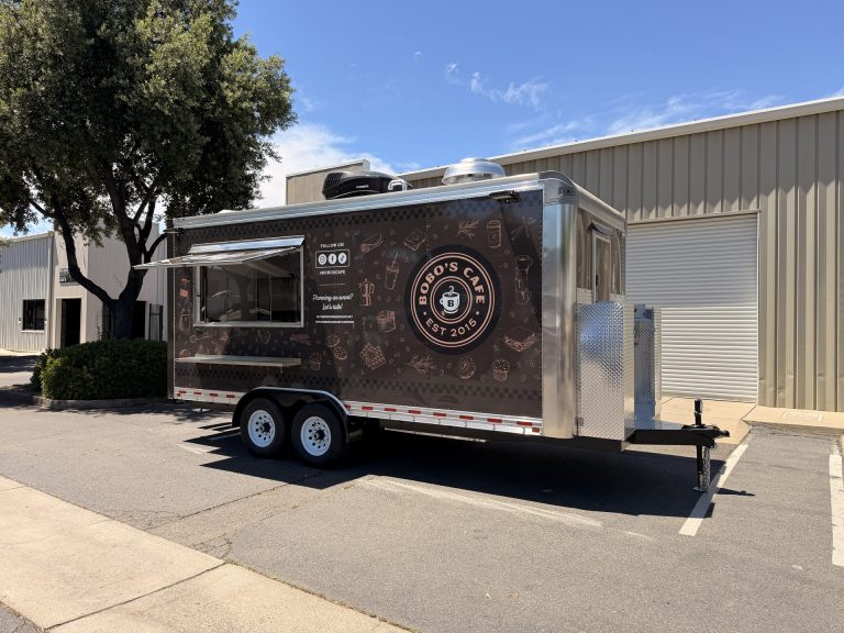 Angled side view of Bobo’s Cafe custom coffee trailer