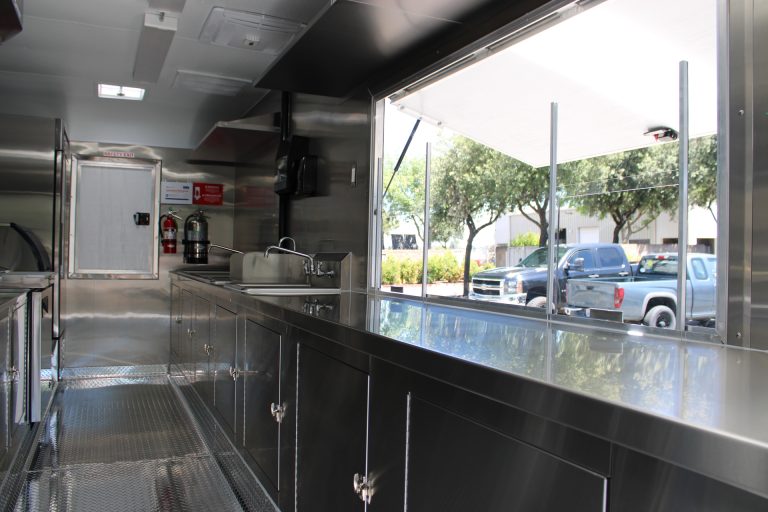Service window and counter inside Bobo’s Cafe coffee trailer