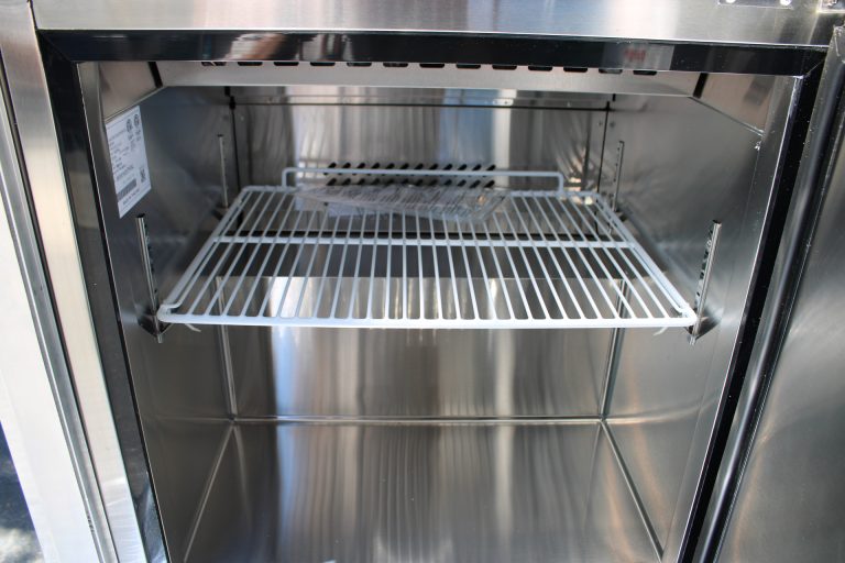 Commercial refrigerator interior in Bobo’s Cafe coffee trailer