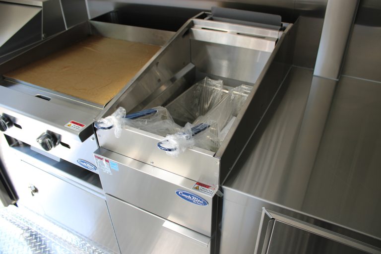 Griddle and fryer in Bobo’s Cafe custom coffee trailer