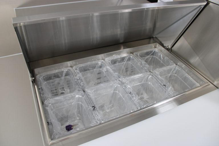Ice storage bin inside Bobo’s Cafe coffee trailer