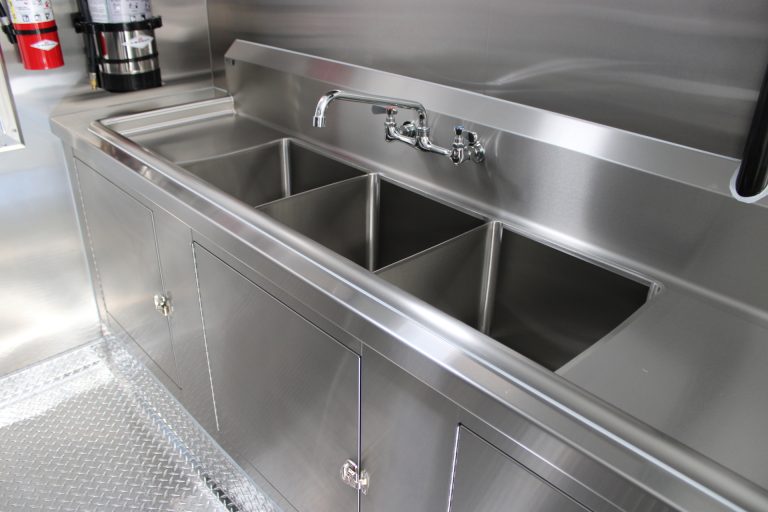 Three-compartment sink inside Bobo’s Cafe custom coffee trailer