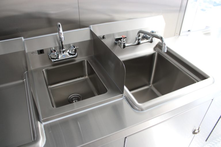 Commercial sink stations inside Bobo’s Cafe coffee trailer