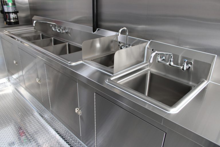 Warewashing and sanitation area inside Bobo’s Cafe coffee trailer