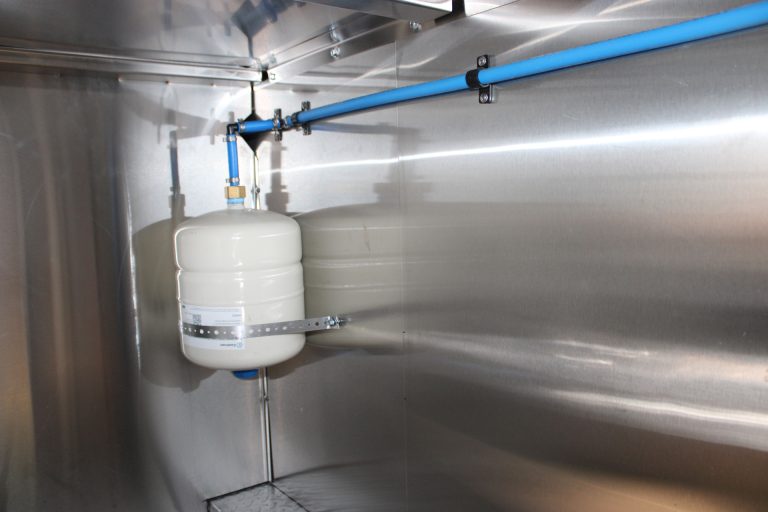 Water system component inside Bobo’s Cafe coffee trailer