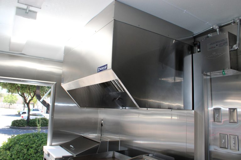 Commercial cooking hood inside Bobo’s Cafe custom coffee trailer