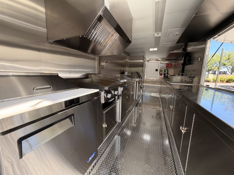 Stainless steel kitchen layout inside Bobo’s Cafe coffee trailer