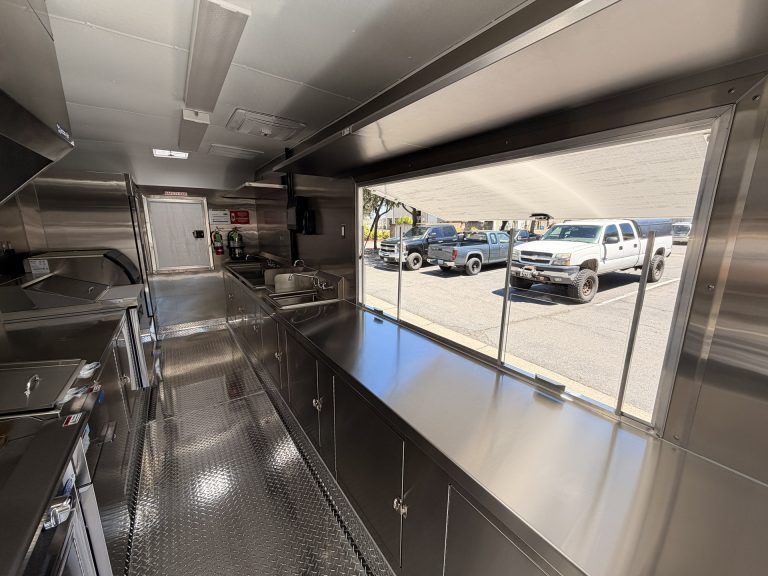 Service counter and window inside Bobo’s Cafe coffee trailer