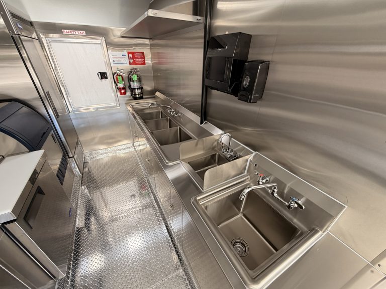 Warewashing and handwashing stations in Bobo’s Cafe coffee trailer