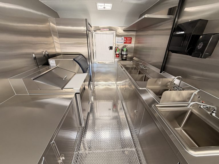 Stainless steel sanitation area in Bobo’s Cafe custom coffee trailer