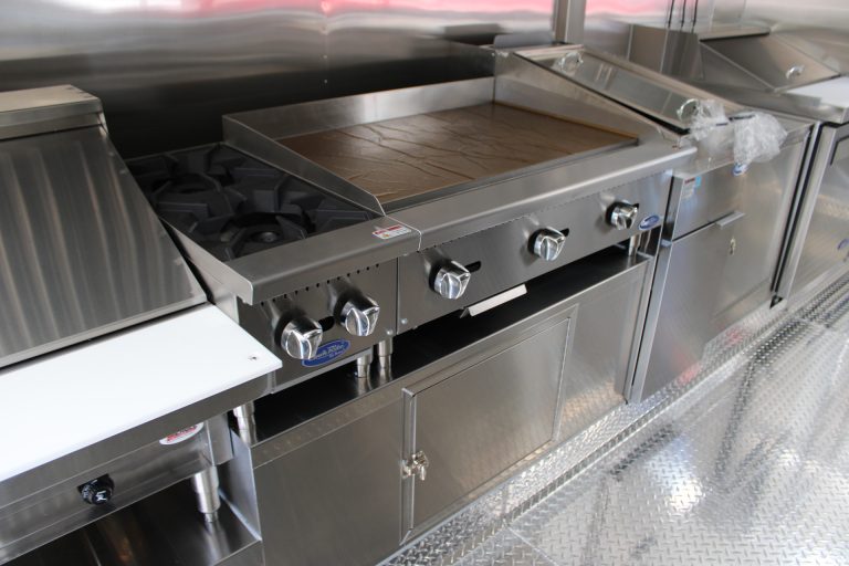 Commercial griddle cooking station in 22-ft school food trailer