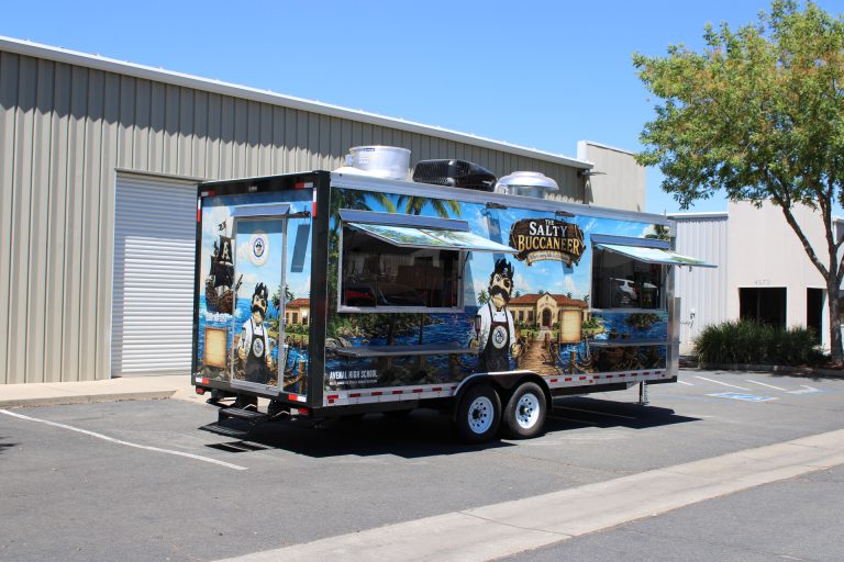 The Salty Buccaneer school food trailer with two open concession windows