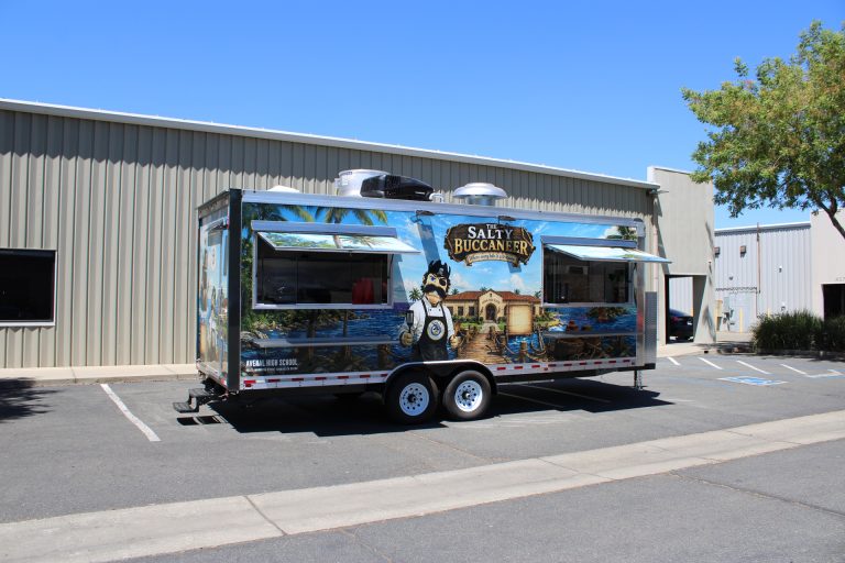 22-ft school food trailer with dual concession windows and service shelves