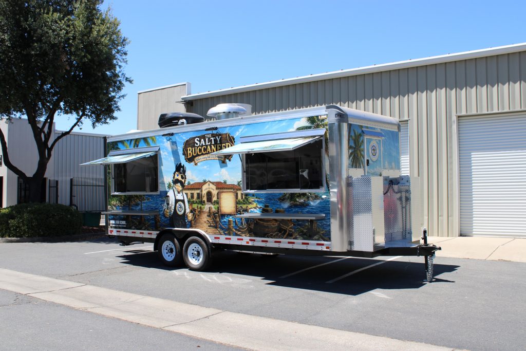 Front three-quarter view of The Salty Buccaneer 22-ft school food trailer