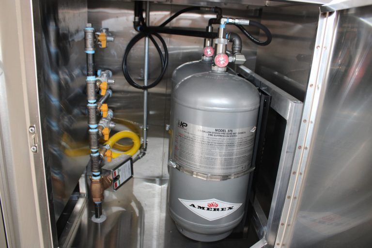 Propane system component inside The Salty Buccaneer school food trailer