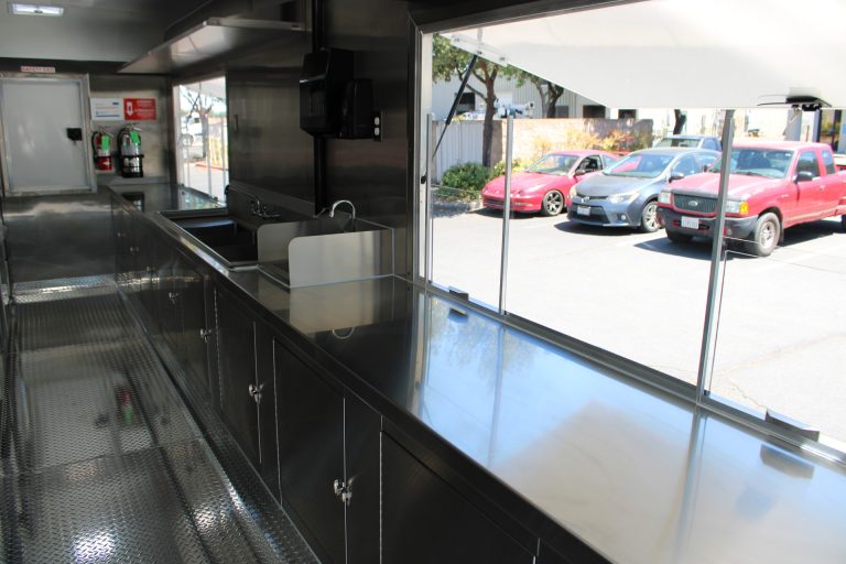 Handwashing station beside service area in The Salty Buccaneer food trailer
