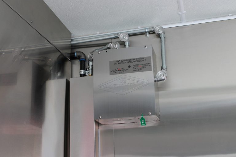 Fire suppression control module inside The Salty Buccaneer school food trailer