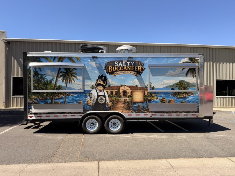 Full service-side profile of The Salty Buccaneer 22-ft school food trailer