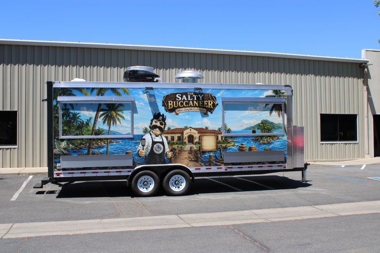 Full side profile of The Salty Buccaneer 22-ft school food trailer