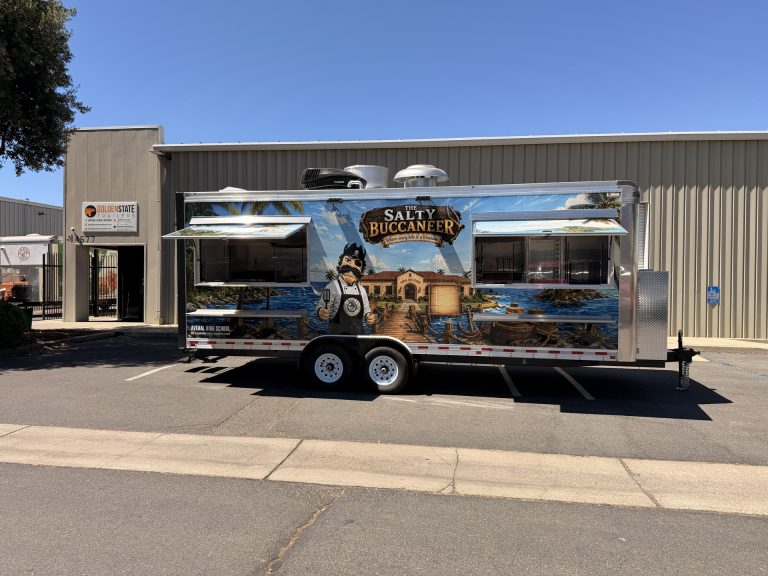 Side profile of The Salty Buccaneer custom school food trailer in Avenal California