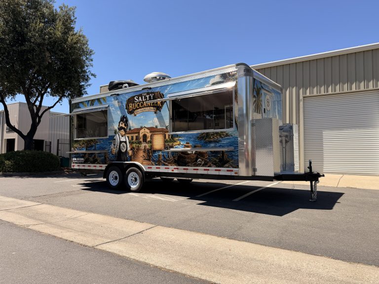 Front three-quarter view of The Salty Buccaneer 22-ft school food trailer