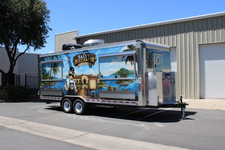 Front exterior view of The Salty Buccaneer custom 22-ft school food trailer