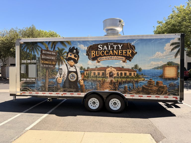 The Salty Buccaneer 22-ft school food trailer full side exterior view