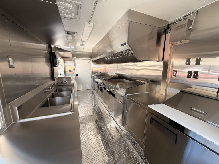Commercial hot-food cooking area inside The Salty Buccaneer school food trailer