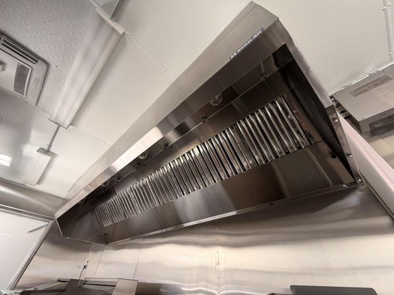 Commercial hood grease filters inside The Salty Buccaneer school food trailer