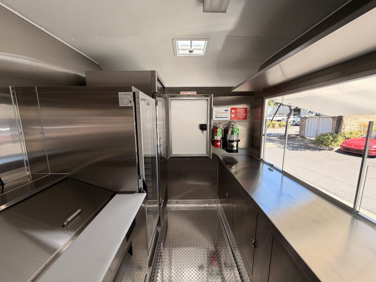 Interior workflow and stainless steel workstations in The Salty Buccaneer food trailer