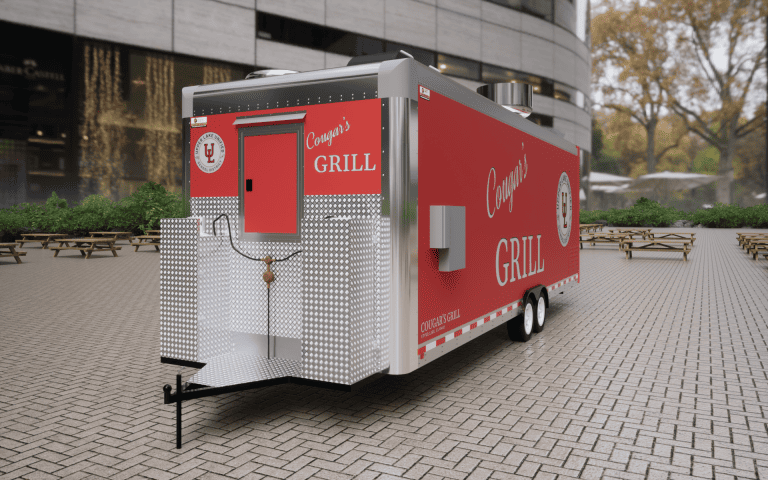 Rear three-quarter 3D view of Cougar’s Grill 24-ft school food trailer