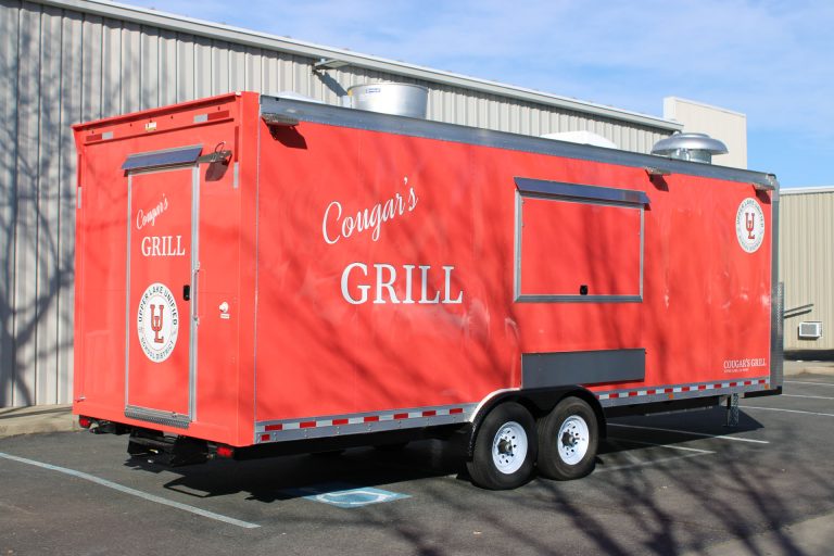Exterior view of the 24-ft Cougar’s Grill custom school food trailer.
