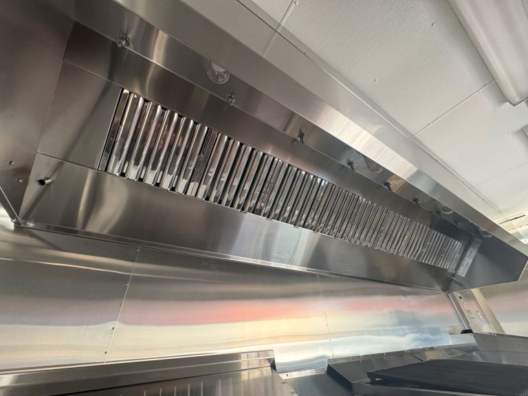 Commercial exhaust hood in 24-ft Cougar’s Grill school food trailer