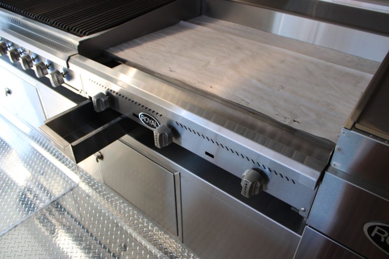 Flat-top griddle workstation in Cougar’s Grill food trailer