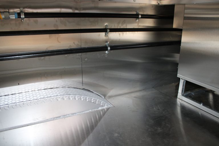 Stainless steel food service station in school food trailer