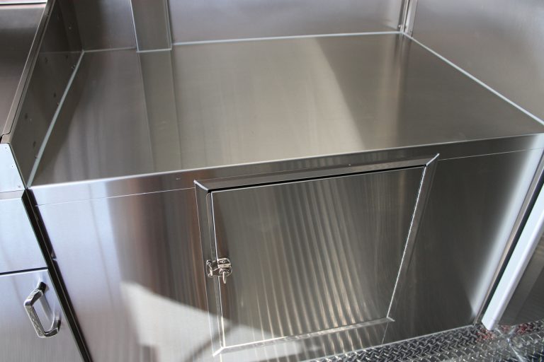 Stainless steel work surface in Cougar’s Grill school food trailer