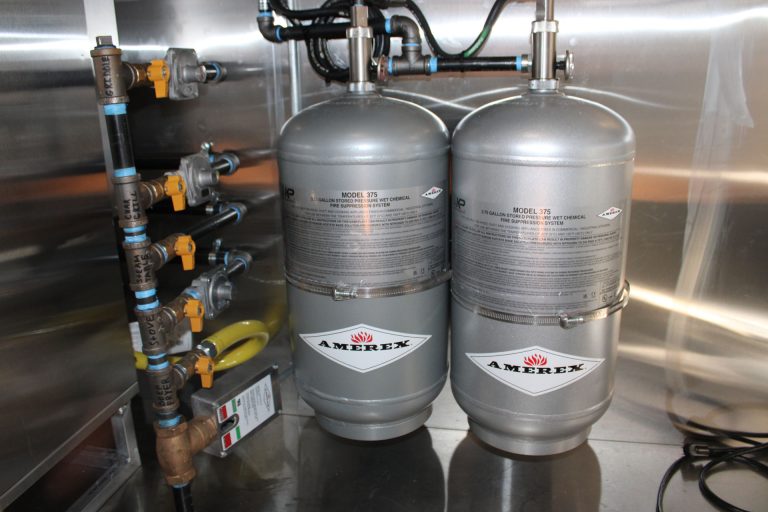 Dual propane cylinders on Cougar’s Grill school food trailer