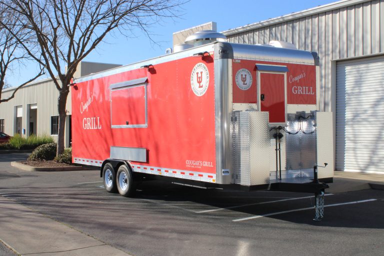 Three-quarter view of the completed Cougar’s Grill school food trailer.
