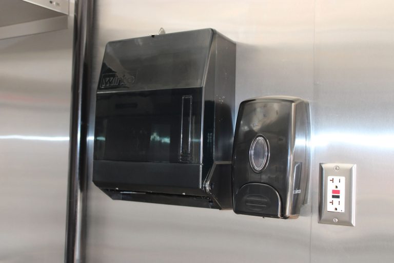 Commercial refrigeration area in Cougar’s Grill school food trailer