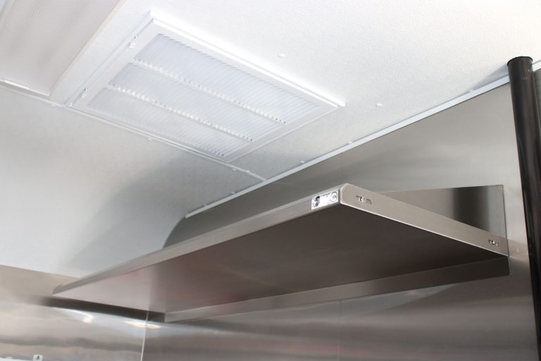 Stainless steel exhaust hood in Cougar’s Grill school food trailer