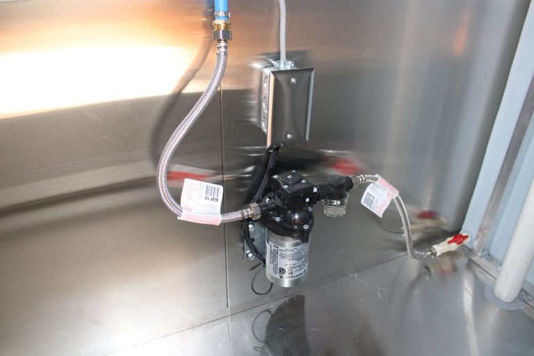 Water system components in Cougar’s Grill school food trailer