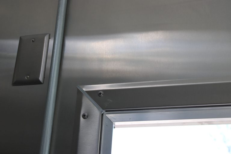 Stainless steel service opening detail in Cougar’s Grill school food trailer