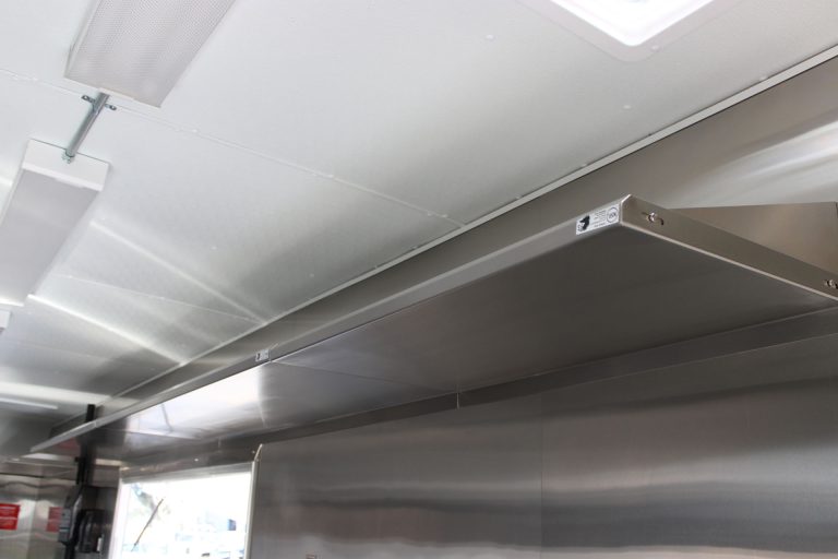 Exhaust hood ceiling detail in Cougar’s Grill school food trailer