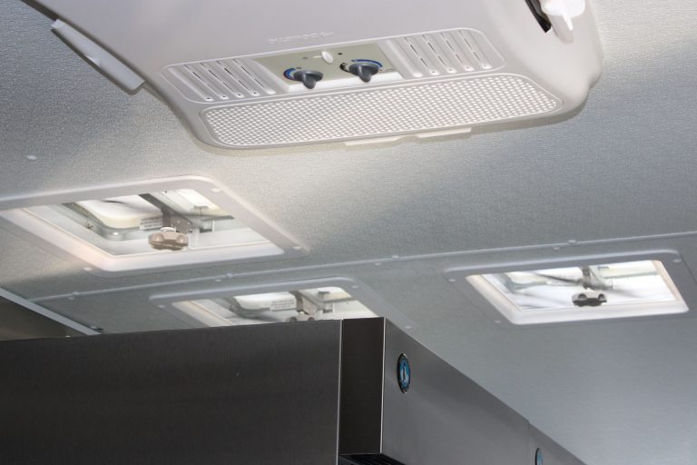 Ceiling air conditioning unit in Cougar’s Grill school food trailer