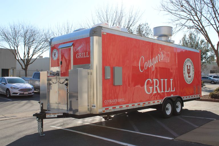 Opposite-side exterior view of the Cougar’s Grill school food trailer.