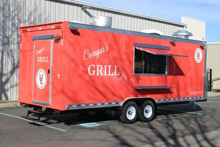 Service-side view of the Cougar’s Grill school food trailer.