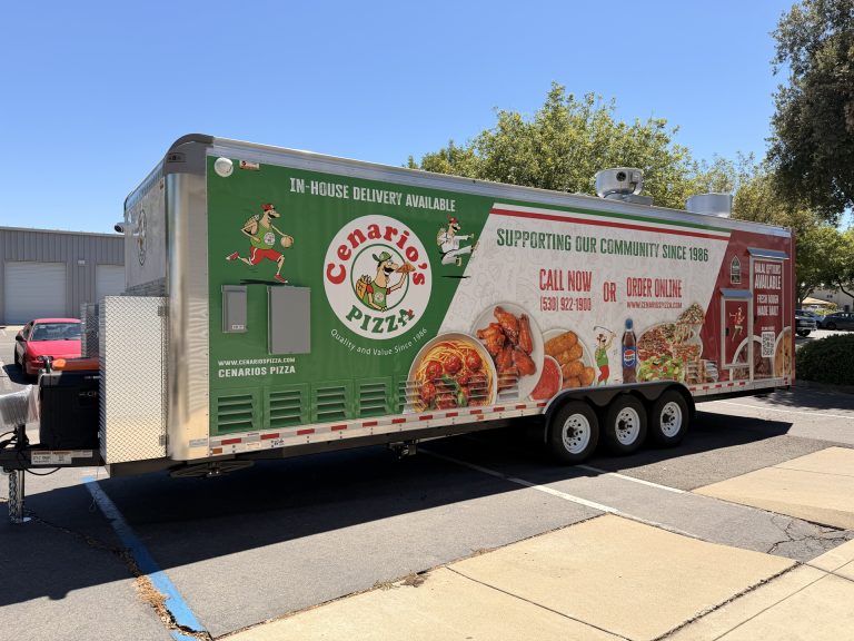 commercial mobile pizza kitchen side view with full custom wrap, service windows, rooftop systems, and triple axles