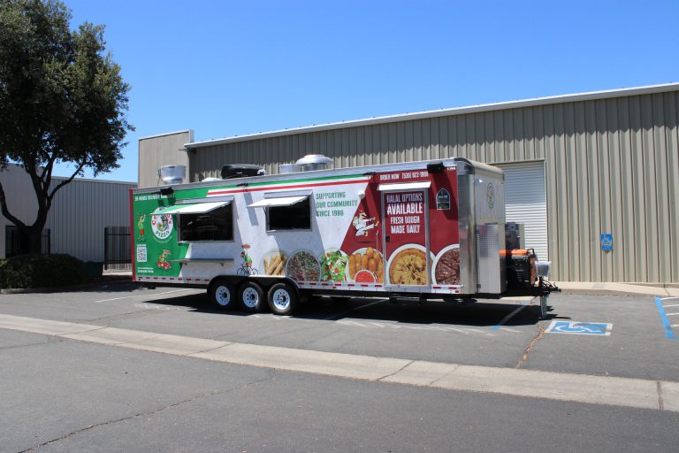 30-ft pizza food trailer exterior with service windows, custom wrap, rooftop ventilation, and commercial trailer body
