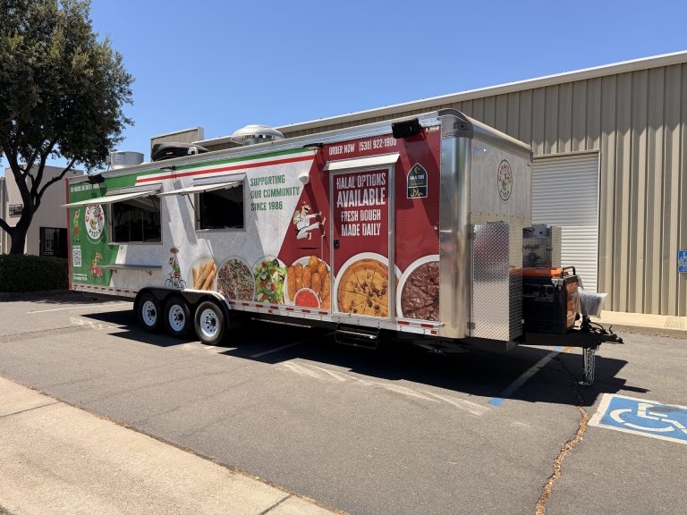 custom pizza food trailer front-side exterior with branded wrap, service area, rooftop systems, and commercial trailer body